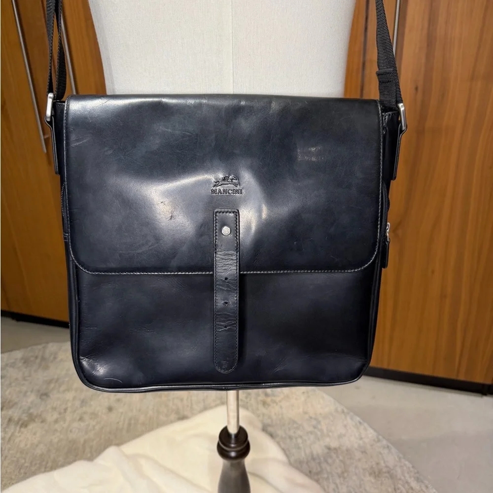 N/A mancini messenger